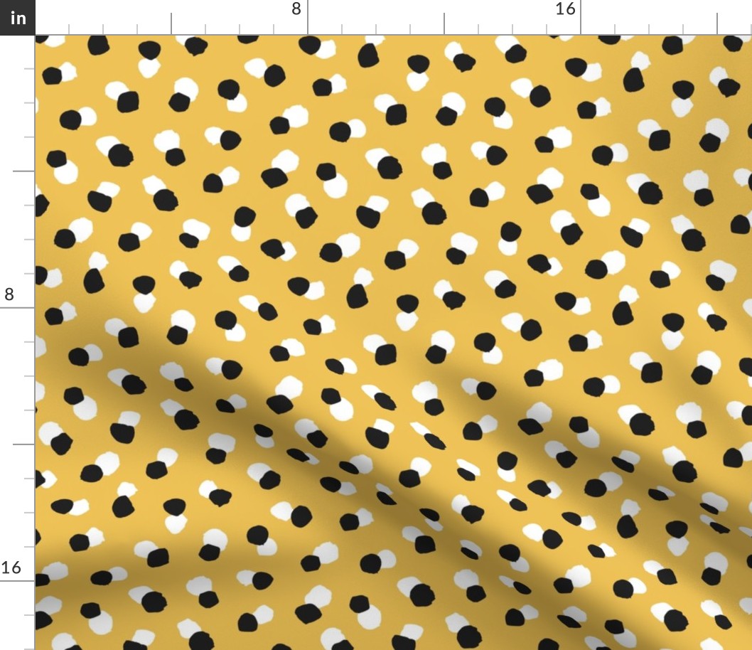 Abstract spots and dots abstract animal print trend design black and white ochre yellow