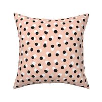 Abstract spots and dots abstract animal print trend design black and white apricot blush