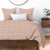 Abstract spots and dots abstract animal print trend design black and white apricot blush