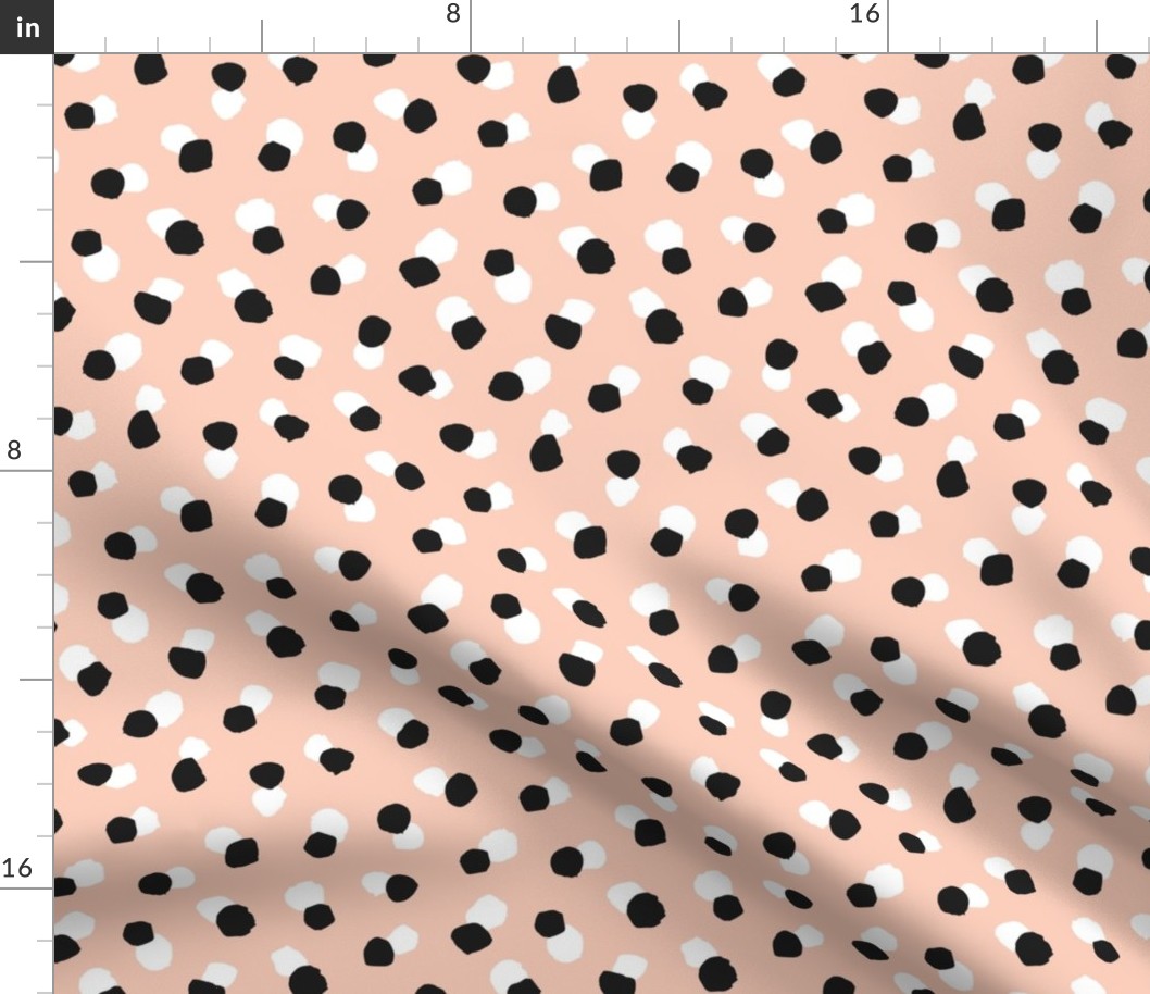 Abstract spots and dots abstract animal print trend design black and white apricot blush