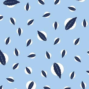 Blue leaves silhouette on dots pattern