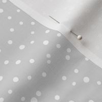 Irregular dots let is snow flakes and spots abstract basic trend minimal print soft gray