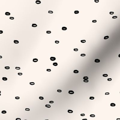Little bubbles and minimal circles abstract ink irregular spots black off white creme