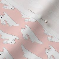 Leaping White Bunnies on Apricot - rotated