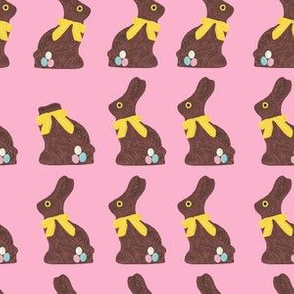 Chocolate easter bunny pink background