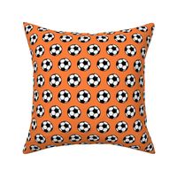 (small scale) Soccer balls on orange  - sports fabric -  LAD19