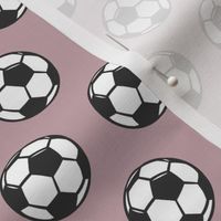(small scale) soccer balls on mauve - sports balls - LAD19