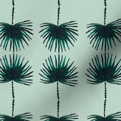 palm leaf on seafoam