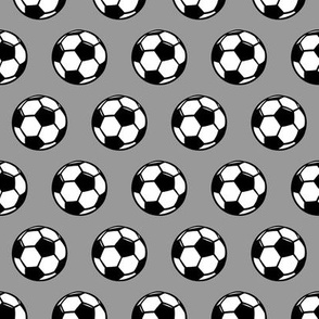 (small scale) soccer balls on grey - sports balls - LAD19
