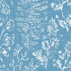 Block print leaves on blue background