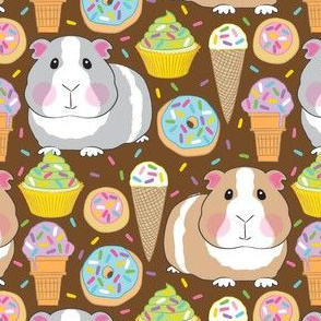 guinea pigs with sprinkle cookies, donuts, cupcakes and ice cream on brown