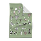 Tea towel fat quarter scale // ABC Geometric animal alphabet // green background black and white animals with green grey and taupe details