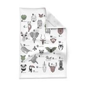 Tea towel fat quarter scale // ABC Geometric animal alphabet // white background black and white animals with green grey and taupe details