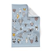 Tea towel fat quarter scale // ABC Geometric animal alphabet // pastel blue background black and white animals with yellow grey blue and taupe details
