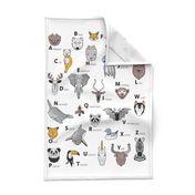 Tea towel fat quarter scale // ABC Geometric animal alphabet // white background black and white animals with yellow grey blue and taupe details