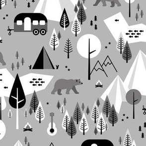 Summer camping grizzly bear in the woods and caravan happy camper mountains wilderness winter ochre boys