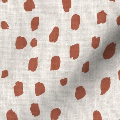 red brown marks on natural linen look Copper coin