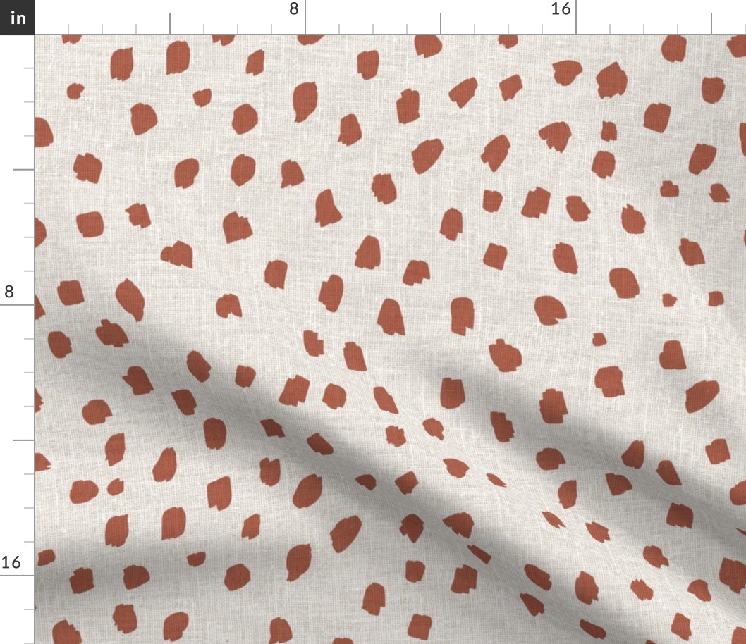 red brown marks on natural linen look Copper coin