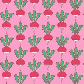 symmetrical red radishes on pink