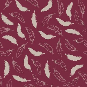 Beige feathers on red background seamless pattern