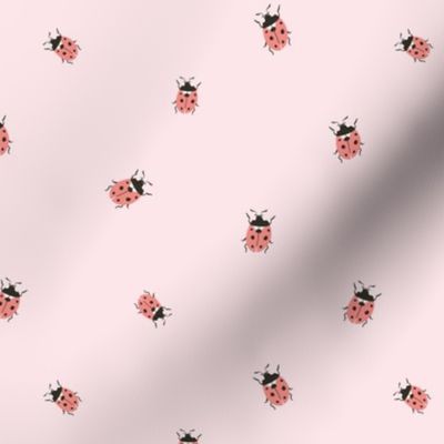 Simple ladybugs on pink