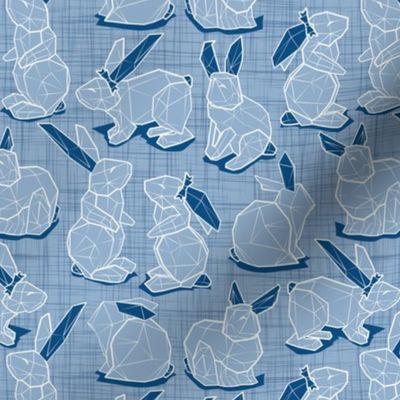 Small scale // Geometric Easter bunnies // slate blue linen texture background blue rabbits with classic blue ears white lines