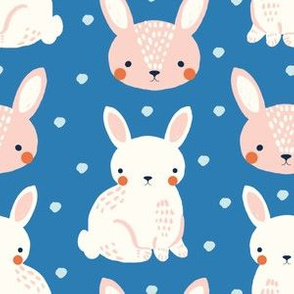 cute bunnies on blue