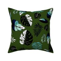 tropical leaves on dark green