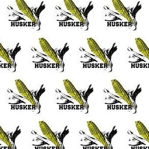 Nebraska fabric with corn cobs and text Husker