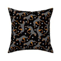 Trotting Beaucerons and paw prints - black