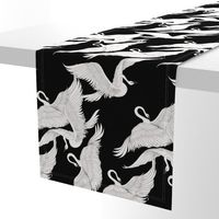 Swans Flying in Black