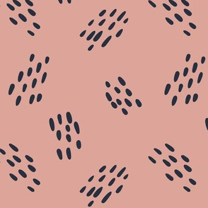 Hand drawn groups of dots on pink