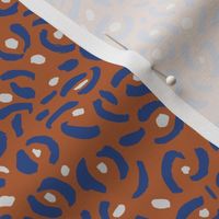 Abstract panther confetti minimal ink spots and strokes leopard trend design rust blue gray