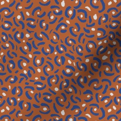 Abstract panther confetti minimal ink spots and strokes leopard trend design rust blue gray