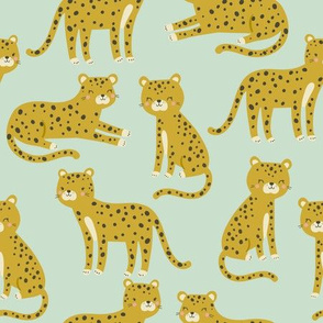 gold leopards on mint green