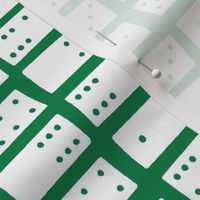 dominoes on green