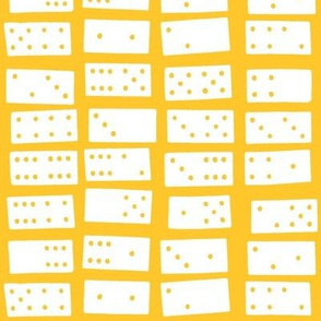 dominoes on yellow