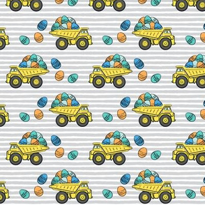 (small scale) dump trucks with easter eggs - orange and blue on grey stripes - C20BS