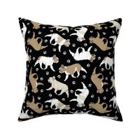 Trotting fawn French Bulldogs and paw prints - black