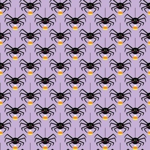 spiders with candycorn on purple