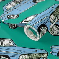 pale blue 1964 1965 Studebaker Lark Cruiser on teal background