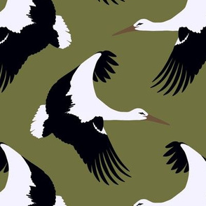 Storks in flight on olive green 7”