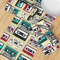 Retro cassette tapes with graffiti on lime