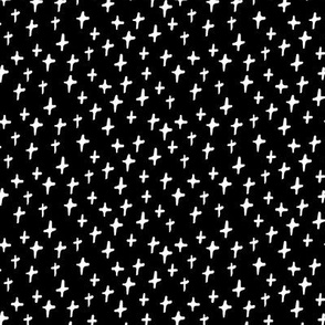 crosses thick white on black doodled ink