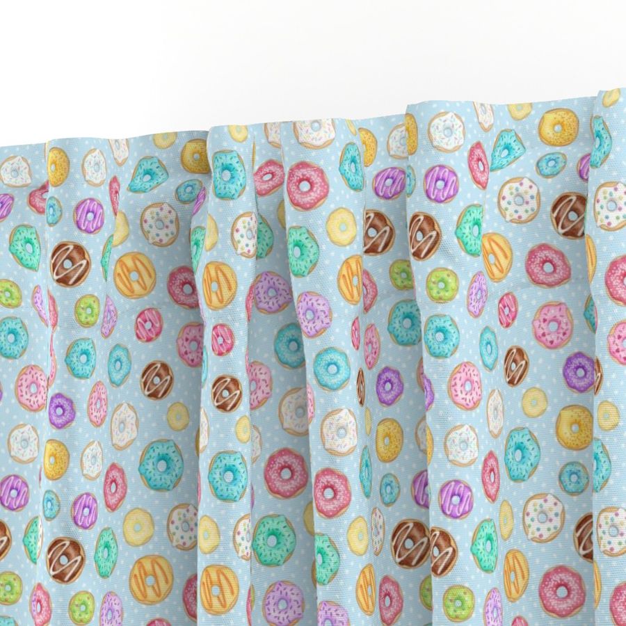 Rainbow Scattered Donuts on spotty pale blue - small scale