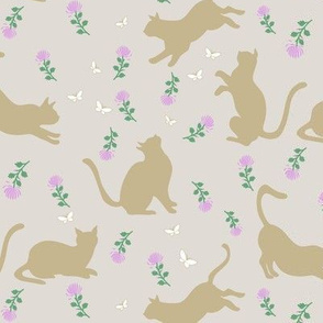 Beige cats with pink flower 
