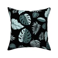 tropical leaves in mint and pine on black