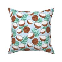 Tropical beach and island vibes coconuts palm and banana leaves