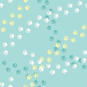 Small scale // Hot dogs chase // aqua background white yellow and aqua paw prints