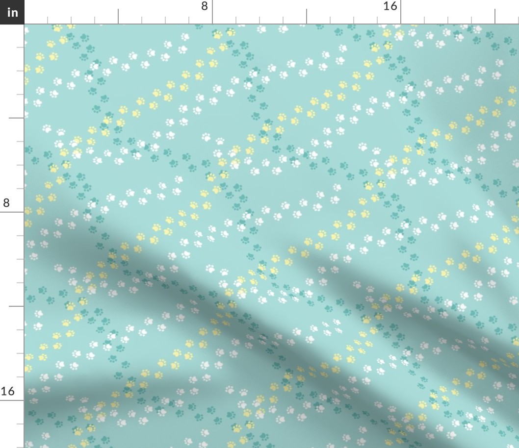 Small scale // Hot dogs chase // aqua background white yellow and aqua paw prints